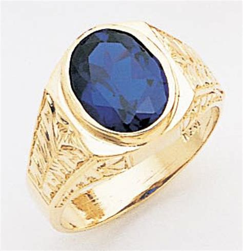 men's gold ring with stone.